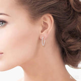 1/2 ctw Round cut Diamond Hoop Earrings in 14K White Gold