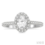 1 1/10 Ctw Oval Halo Round Cut Diamond Engagement Ring With 3/4 Ct Oval Cut Center Stone in 14K White Gold