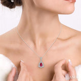 6x4 MM Pear Shape Ruby and 1/10 Ctw Round Cut Diamond Pendant in 14K White Gold with Chain