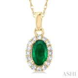 5x3 MM Oval Shape Emerald and 1/20 Ctw Single Cut Diamond Halo Precious Pendant with Chain in 10K Yellow Gold