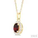 5x3 MM Oval Shape Garnet and 1/20 Ctw Single Cut Diamond Halo Semi-Precious Pendant with Chain in 14K Yellow Gold