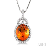 11x9 MM Oval Cut Citrine and 1/3 Ctw Round Cut Diamond Pendant in 14K White Gold with Chain