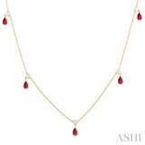 1/4 ctw Round Cut Diamonds and 5X3MM Pear Shape Ruby Precious Station Necklace in 14K Yellow Gold