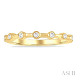 1/10 Ctw Bezel Set Round Cut Diamond Stackable Wedding Band in 14K Yellow Gold